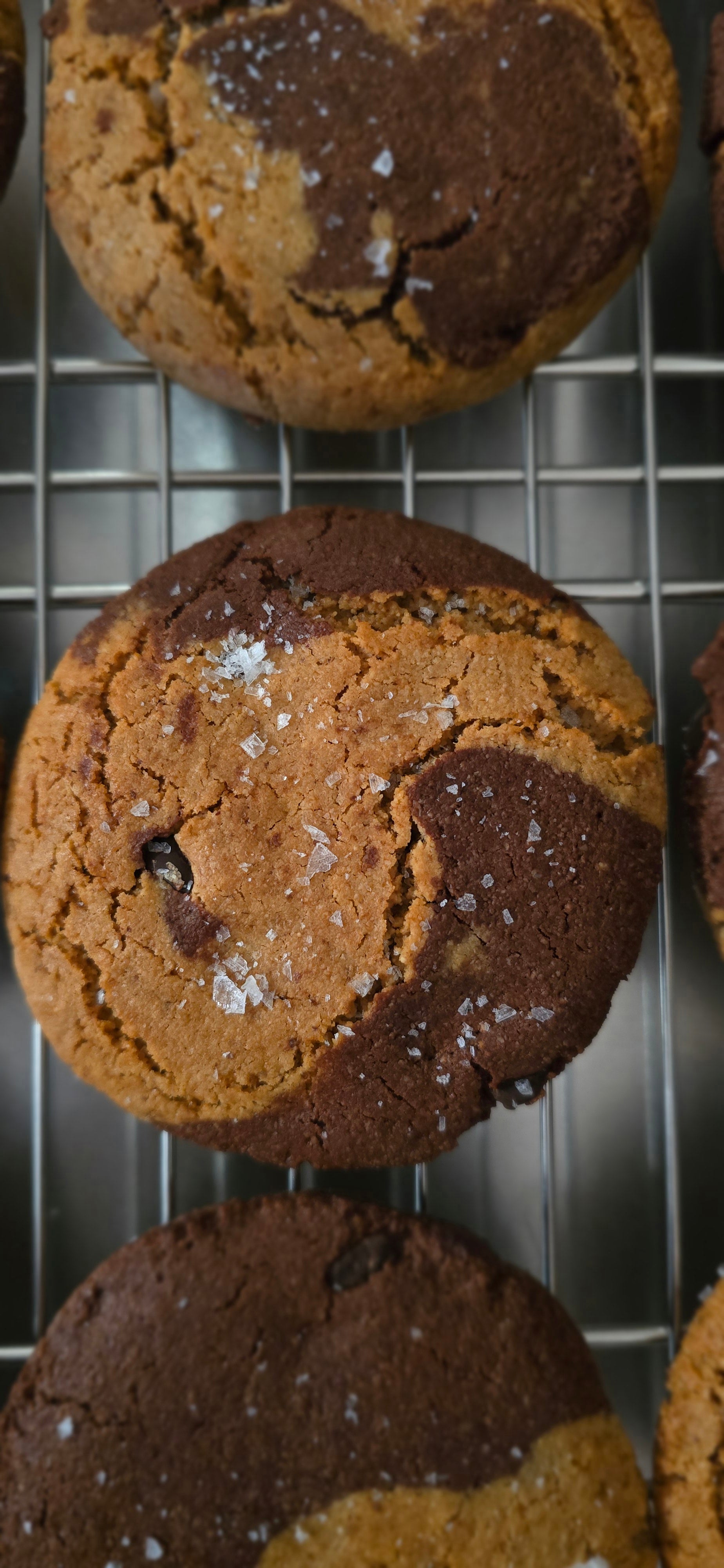 Chocolate peanut butter marble cookies on a cooling rack